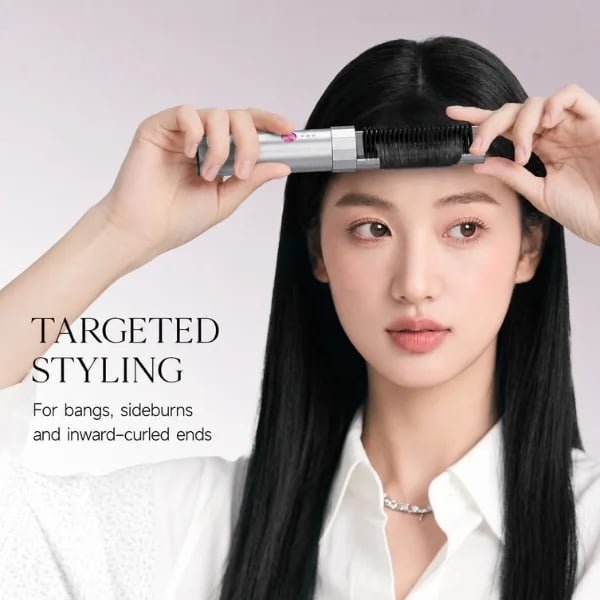 Woman using the K6 cordless mini styling brush on her bangs