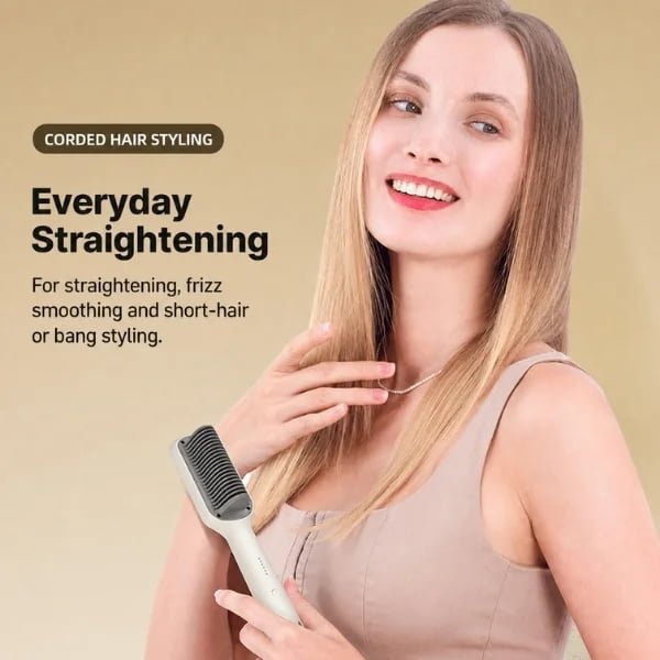 Woman holding the KD680 corded hair straightening brush for everyday styling