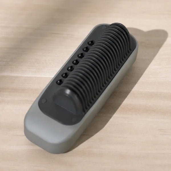 Close-up of KD880 anti-scald comb teeth and steam outlets