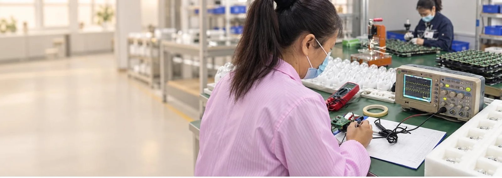 K·SKIN engineer conducting electrical testing for beauty device OEM and ODM development