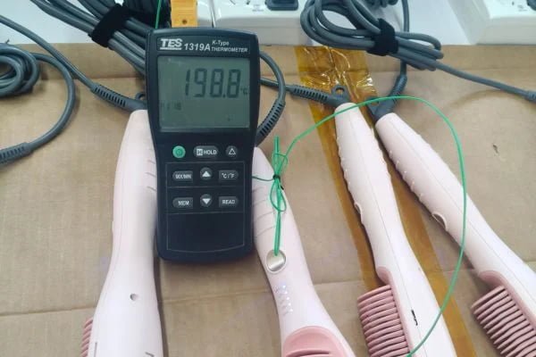 B2B straightener brush sample heating test Image showing three straightener brush samples connected to thermocouples and a data logger in a controlled temperature test