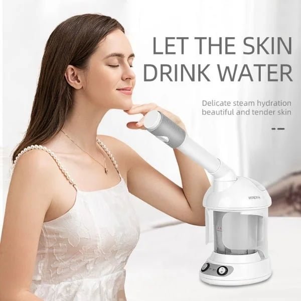 Woman using KD2328A facial steamer spray nozzle for skin hydration